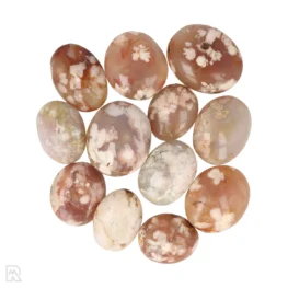 a kilo of boom agate hand stones pictured on a white background. the photo shows a varied assortment of what customers can approximately expect when purchasing.